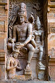 The great Chola temples of Tamil Nadu - The Brihadisvara temple of Gangaikondacholapuram. Detail of the panel of Shiva bestowing a wreath on the patron of the royal temple (North).  